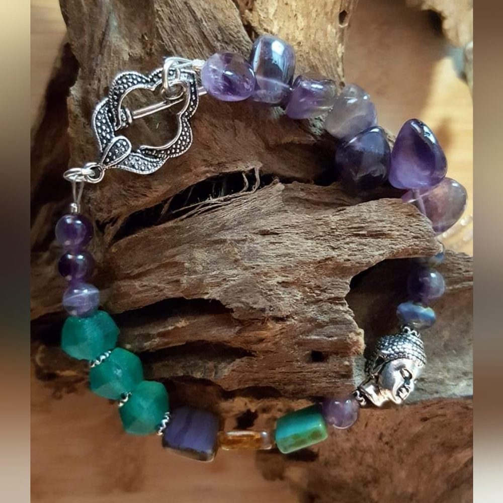 Handmade Buddha head bracelet with amethyst rocks and Czech beads.